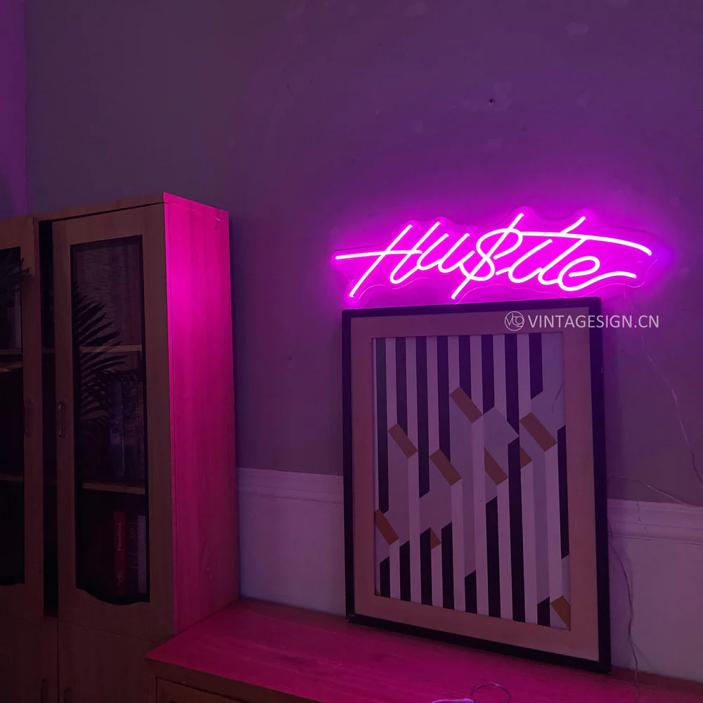 'Hu$tle' neon sign
